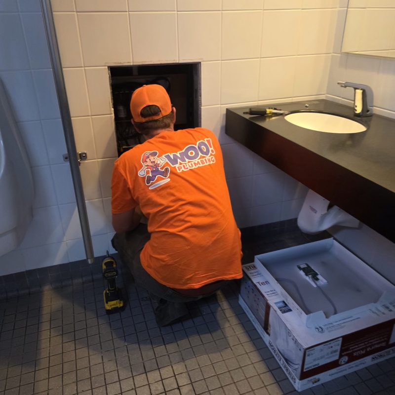 About Woo Plumbing - plumber fixing emergency