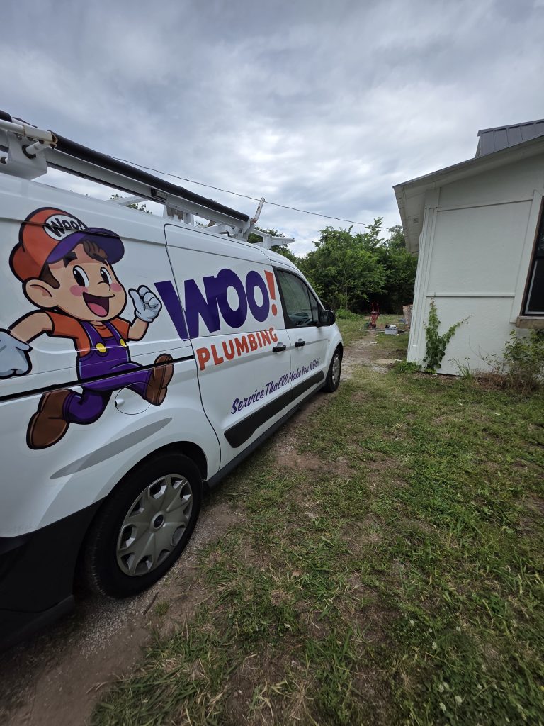 Woo Plumbing van on-site